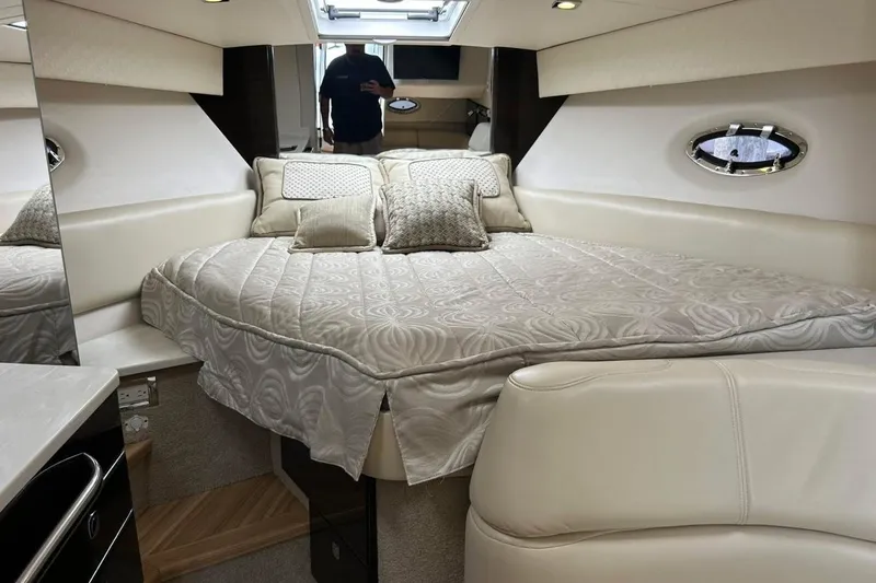 Slide: The Image of Luxurious interior of a 2016 Formula 31 Performance Cruiser with elegant bedding and modern design. - 20
