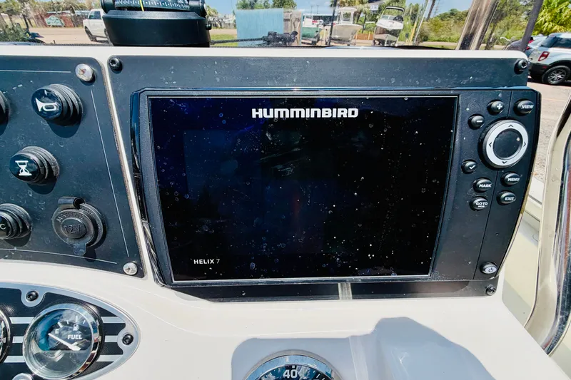 Slide: The Image of 2021 Ranger RB200 boat dashboard with Humminbird Helix 7 fish finder display. - 14
