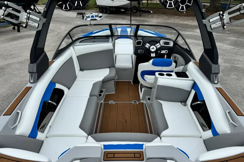 Slide: The Image of 2017 Tigé R23 boat interior with modern seating and sleek dashboard design. - 10