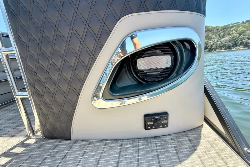 Slide: The Image of 2019 Barletta L23QC SS boat speaker and control panel with lake view. - 28
