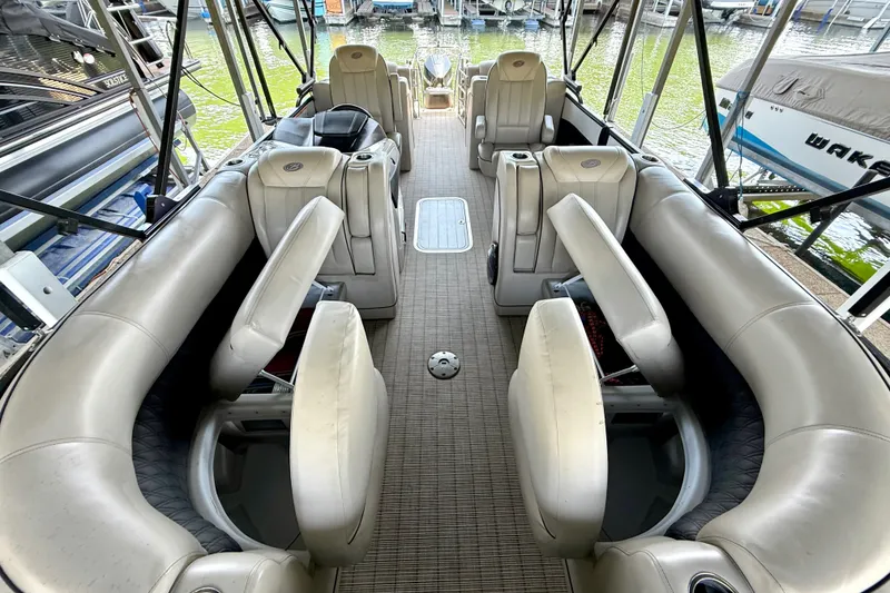 Slide: The Image of 2019 Barletta L23QC SS pontoon boat interior with plush seating and spacious layout. - 43