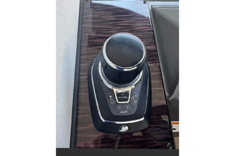 Slide: The Image of Control panel of a 2019 Carver C37 boat with joystick and Skyhook feature. - 15