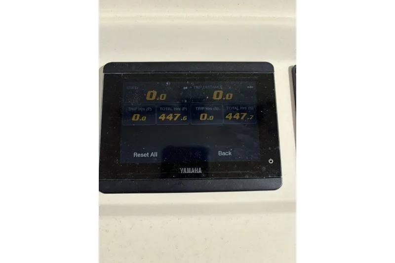 Slide: The Image of Yamaha display showing trip and total hours on 2021 Scout 255 LXF boat. - 8