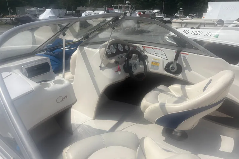 Slide: The Image of 2011 Tahoe Q4 SF boat interior with steering wheel and dashboard controls. - 5