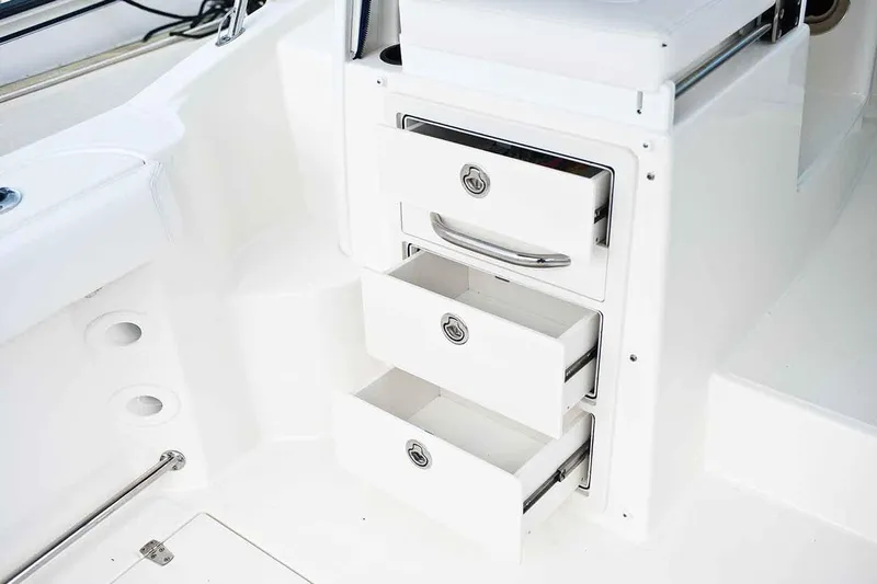 Slide: The Image of Manufacturer Provided Image: 2020 Boston Whaler 285 Conquest boat interior storage drawers. - 3