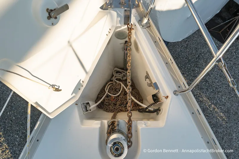 Slide: The Image of Anchor locker of 2004 Jeanneau Sun Odyssey 43 DS sailboat with chain and rope. - 28