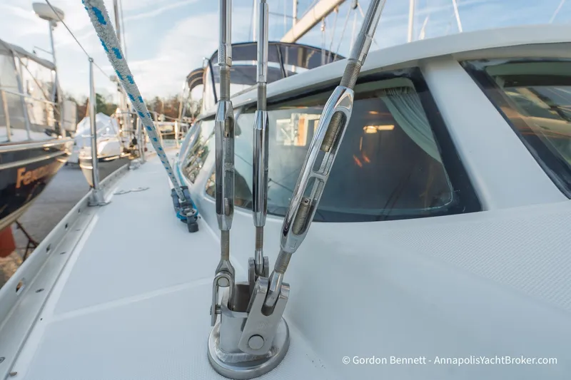Slide: The Image of 2004 Jeanneau Sun Odyssey 43 DS deck with rigging and windows. - 22