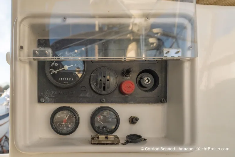 Slide: The Image of Control panel of 2004 Jeanneau Sun Odyssey 43 DS yacht with gauges and switches. - 58