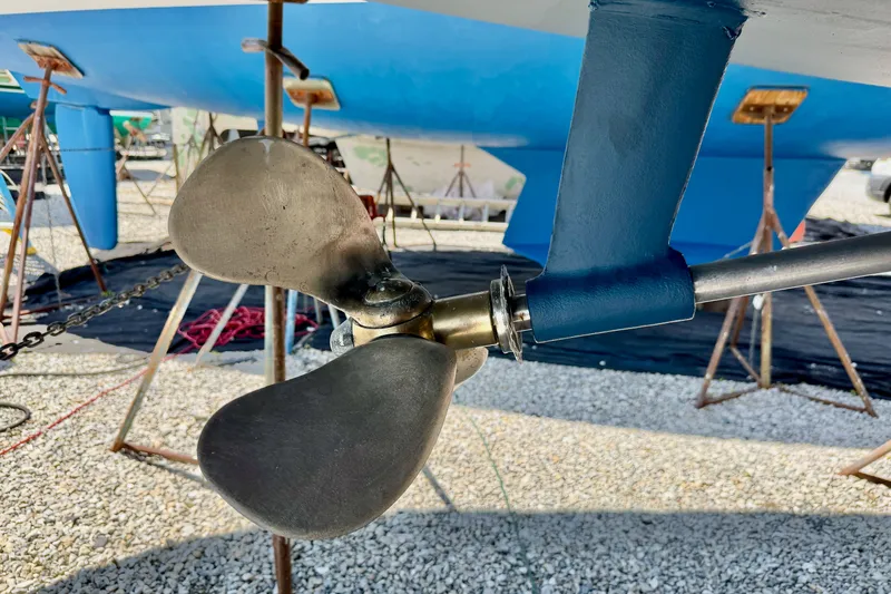 Slide: The Image of Propeller of 2004 Jeanneau Sun Odyssey 43 DS sailboat on dry dock. - 63