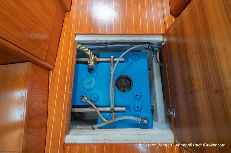 Slide: The Image of Blue water tank in 2004 Jeanneau Sun Odyssey 43 DS yacht interior compartment. - 55