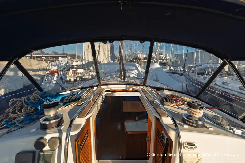 Slide: The Image of 2004 Jeanneau Sun Odyssey 43 DS yacht cockpit with marina view. - 30