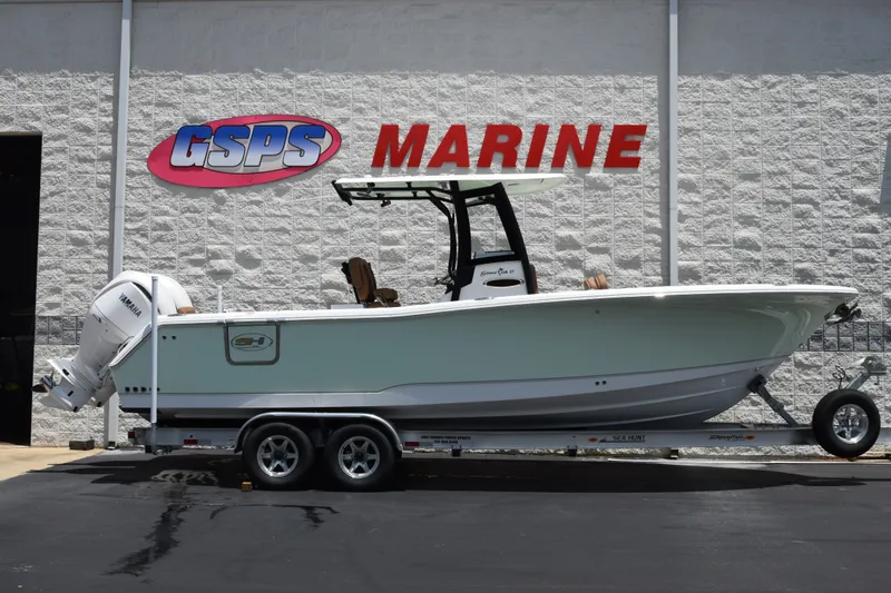 The Image of 2027 Sea Hunt Gamefish 27FS boat on trailer at GSPS Marine dealership. - 1