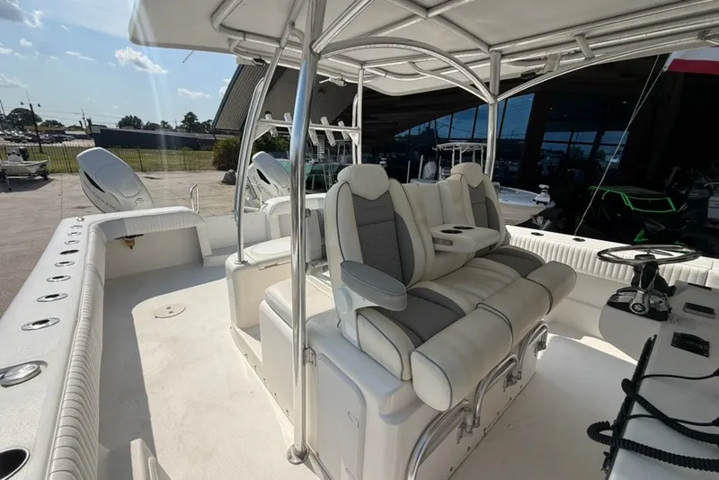 Slide: The Image of 2018 Twin Vee 36 Center Console boat interior with seating and steering area. - 20