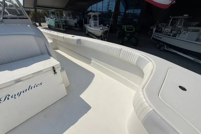 Slide: The Image of 2018 Twin Vee 36 Center Console boat interior with seating and storage. - 31