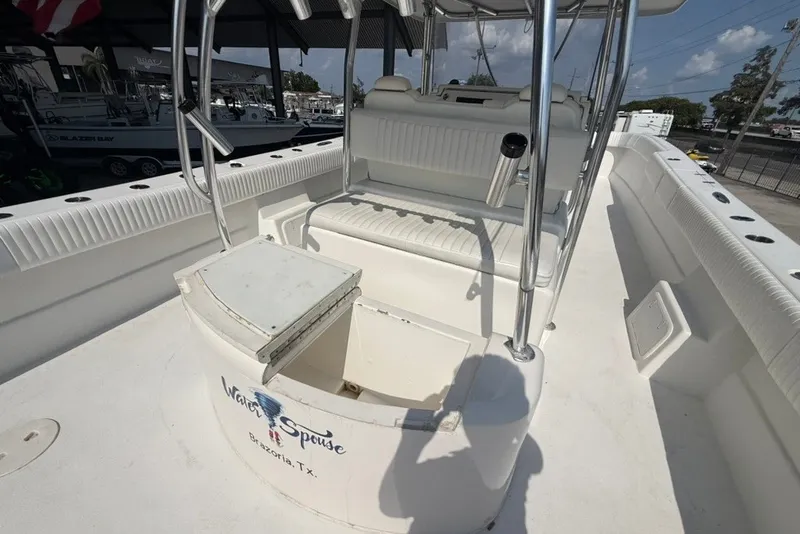 Slide: The Image of 2018 Twin Vee 36 Center Console boat interior with seating and storage. - 15