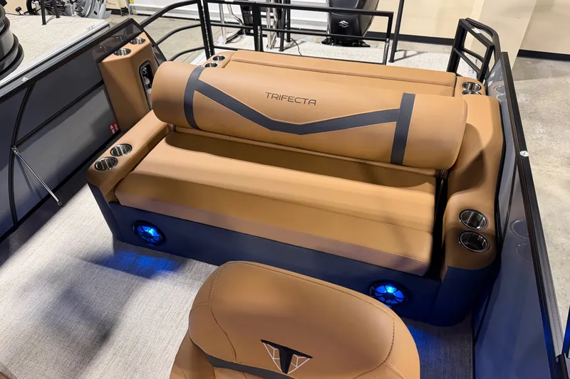 Slide: The Image of Luxurious seating in the 2027 Trifecta 24 ULCS 3.0 pontoon boat with cup holders and ambient lighting. - 15
