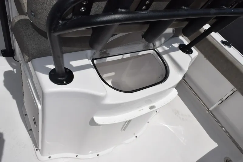Slide: The Image of Interior view of a 2027 Sea Hunt Ultra 229 boat, featuring a storage compartment. - 16