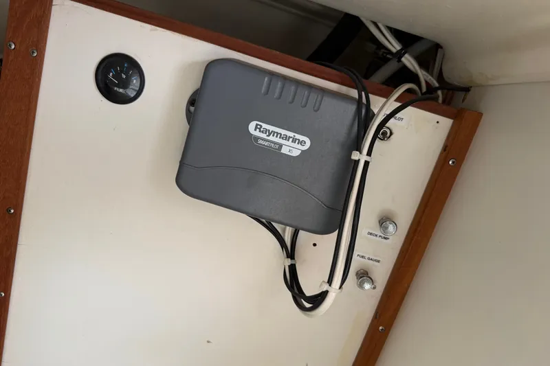 Slide: The Image of Raymarine autopilot system in a 1998 Catalina 250 sailboat interior. - 47