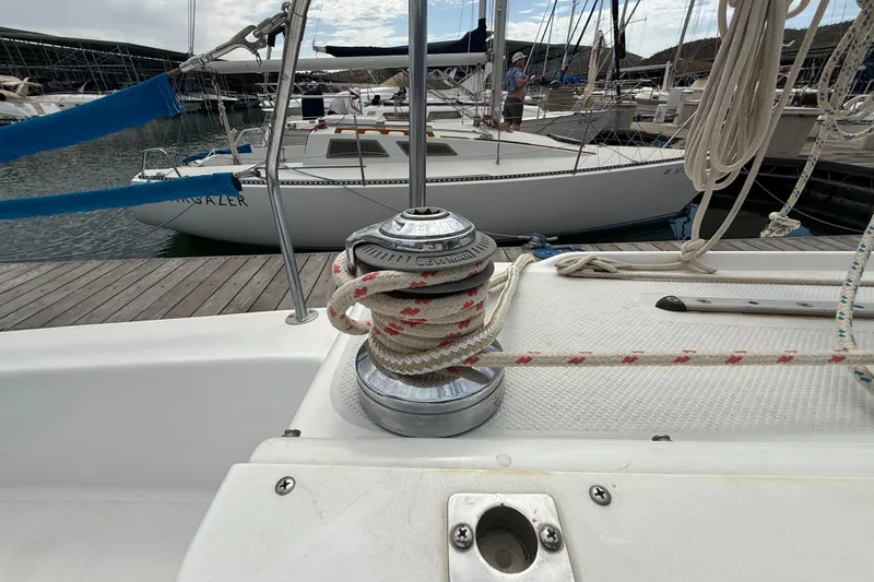 Slide: The Image of Sailboat deck with winch and ropes, Catalina 250, 1998 model, docked at marina. - 30