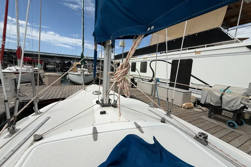 Slide: The Image of Sailboat docked at marina, Catalina 250 model, 1998, with blue sail cover. - 34