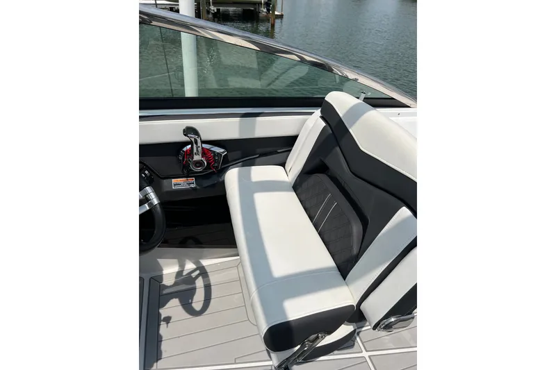 Slide: The Image of 2024 Monterey 275SS Super Sport boat interior with sleek seating and modern controls. - 23