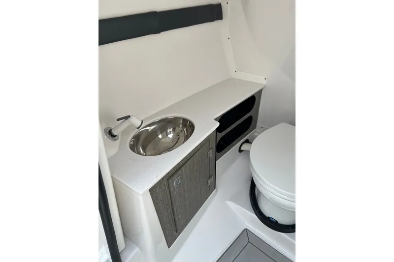 Slide: The Image of 2024 Monterey 275SS Super Sport boat bathroom with sink and toilet. - 35