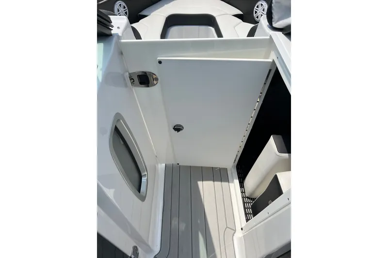 Slide: The Image of 2024 Monterey 275SS Super Sport boat interior with sleek white design and modern features. - 25