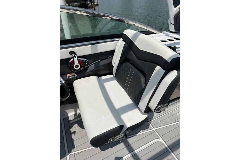 Slide: The Image of 2024 Monterey 275SS Super Sport boat seat, featuring sleek black and white design. - 24