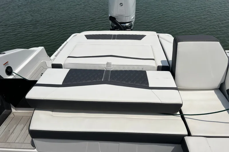 Slide: The Image of 2024 Monterey 275SS Super Sport boat with sleek white seating and modern design. - 42
