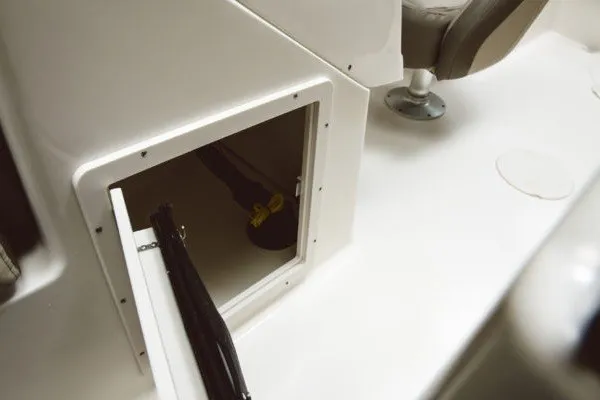 Slide: The Image of Open storage compartment on 2027 Key West 203 DFS boat interior. - 14