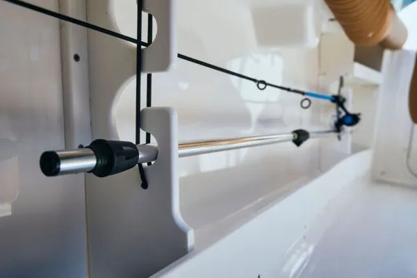 Slide: The Image of 2027 Key West 239 DFS boat interior with fishing rod holders. - 28