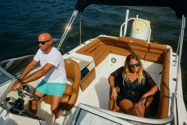 Slide: The Image of Two people enjoying a ride on a 2027 Key West 239 DFS boat. - 24