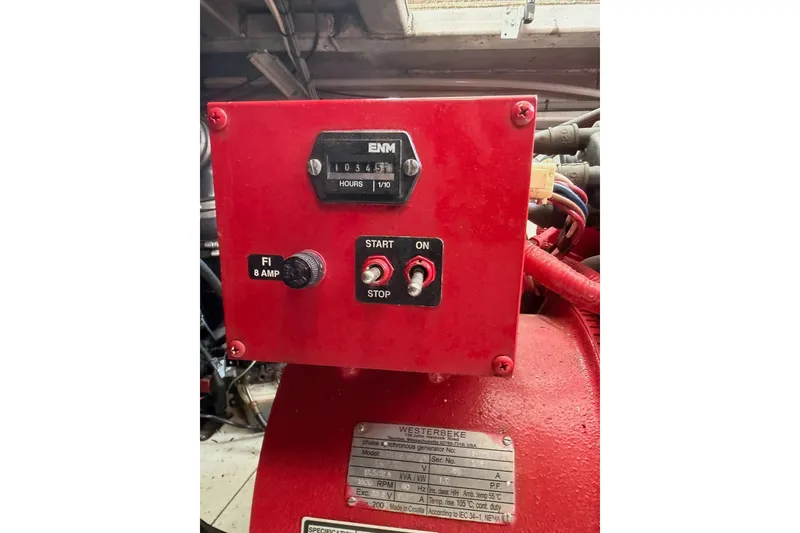 Slide: The Image of Red control panel with hour meter and switches on Lakeview machinery. - 54