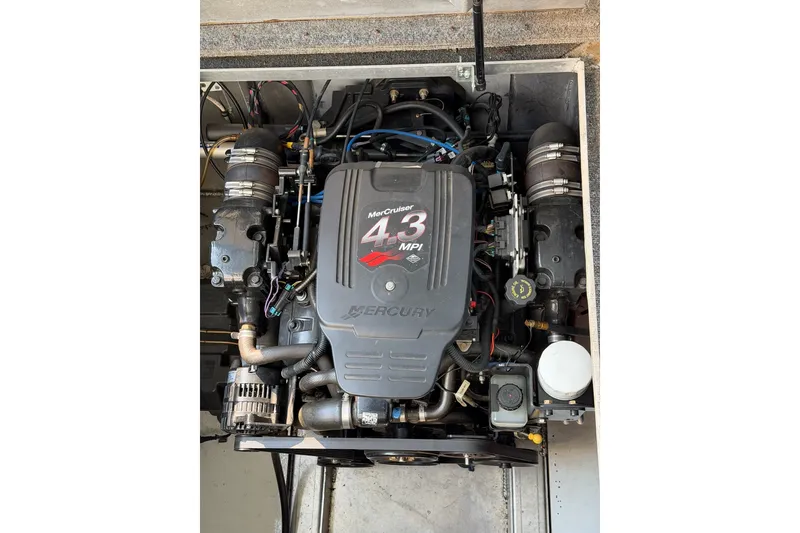 Slide: The Image of MerCruiser 4.3 MPI engine in a Lakeview boat, showcasing detailed components and design. - 52