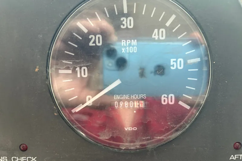 Slide: The Image of Close-up of Tiara Yachts 3500 Open 2002 tachometer showing 980 engine hours. - 36