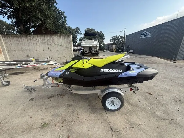Slide: The Image of A 2024 Sea-Doo Spark Trixx for 3 on a trailer, ready for adventure. - 3