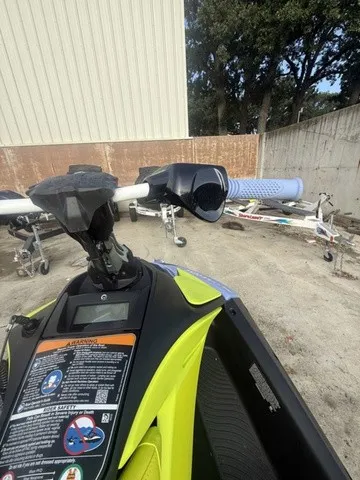 Slide: The Image of A 2024 Sea-Doo Spark Trixx for 3 on a trailer in a yard. - 9