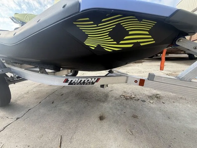 Slide: The Image of A 2024 Sea-Doo Spark Trixx for 3 on a Triton trailer. - 8