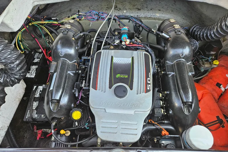 Slide: The Image of Engine compartment of a 2013 Larson LSR 2300 I/O boat with MerCruiser 5.0 MPI engine. - 18