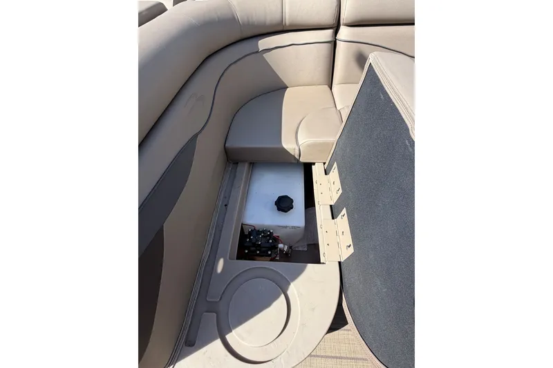 Slide: The Image of Bennington L 25 FISHING SSAPG 2022 boat storage compartment with open hatch. - 13