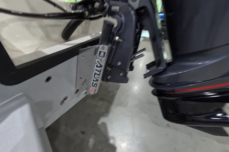 Slide: The Image of Close-up of a 2027 Pathfinder 2200 Hybrid boat motor with Atlas jack plate. - 23