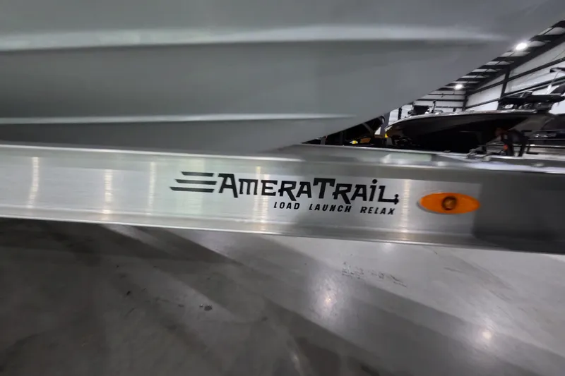 Slide: The Image of Trailer with "AmeraTrail" branding, showcasing Pathfinder 2200 Hybrid 2027 model in a warehouse setting. - 28