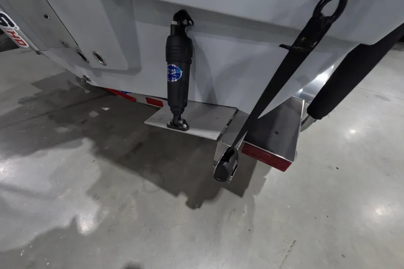 Slide: The Image of Rear view of a 2027 Pathfinder 2200 Hybrid boat with hydraulic components. - 24