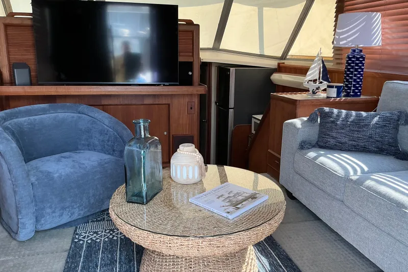 Slide: The Image of Interior of 1985 Bertram 42 Convertible yacht with modern furnishings and decor. - 8
