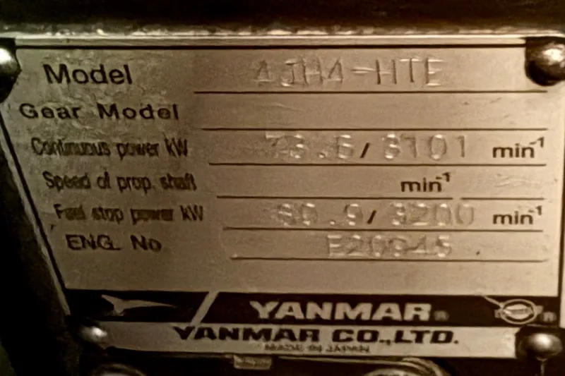Slide: The Image of Yanmar engine plate on a 2008 Beneteau 49, displaying model and power specifications. - 14