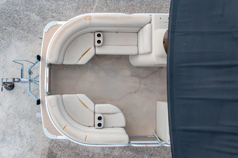 Slide: The Image of Overhead view of 2016 South Bay 5220CR pontoon boat interior with seating and canopy. - 36