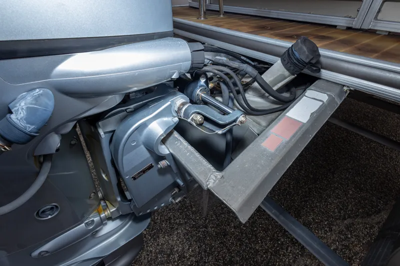 Slide: The Image of Close-up of a 2016 South Bay 5220CR boat engine and propeller system. - 35