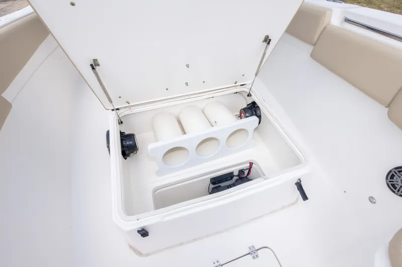 Slide: The Image of Open storage compartment on 2016 Sea Fox 288 Commander boat, showcasing interior features. - 40