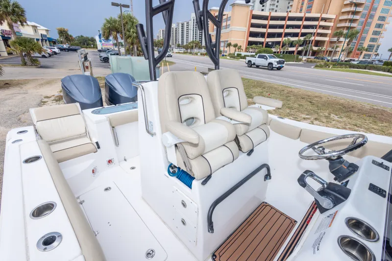 Slide: The Image of 2016 Sea Fox 288 Commander boat interior with dual seats and steering wheel. - 47
