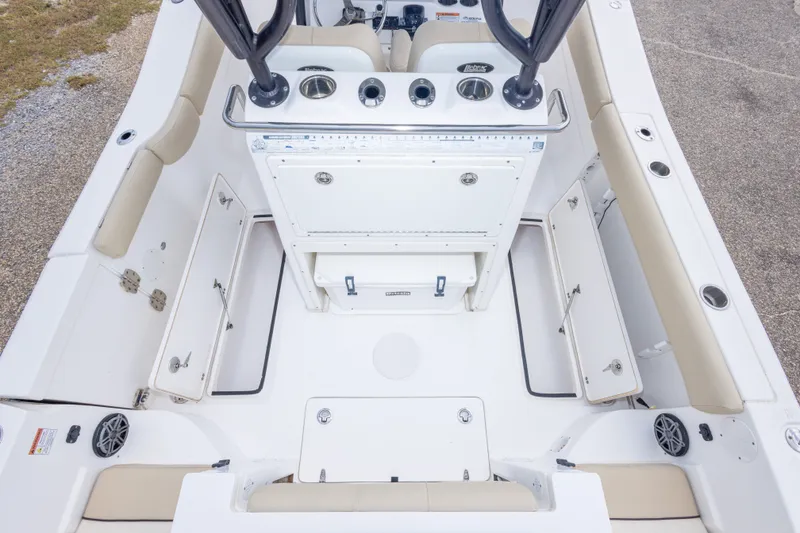 Slide: The Image of 2016 Sea Fox 288 Commander boat interior with seating and storage compartments. - 52